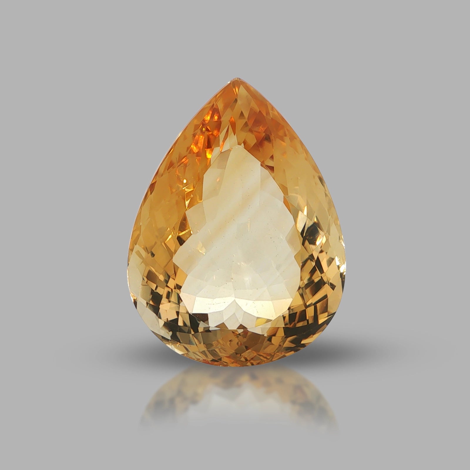 Natural citrine, 42.68 carats, pear cut, golden-yellow color, measuring 28.28 × 21.12 × 13.28 mm