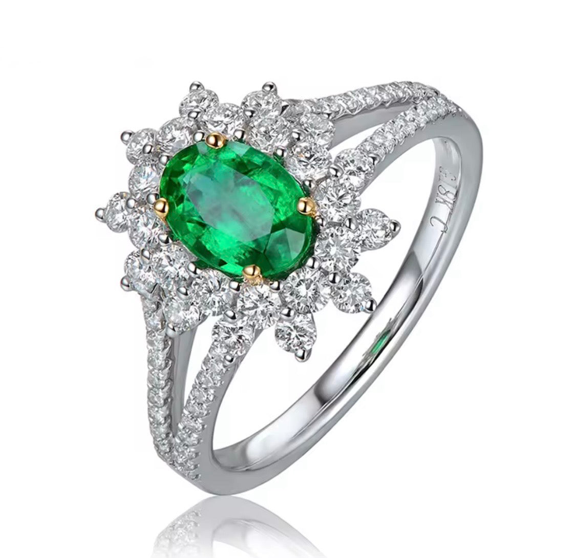 0.87 ct natural oval emerald and 0.84 ct diamond halo ring in 14K white gold