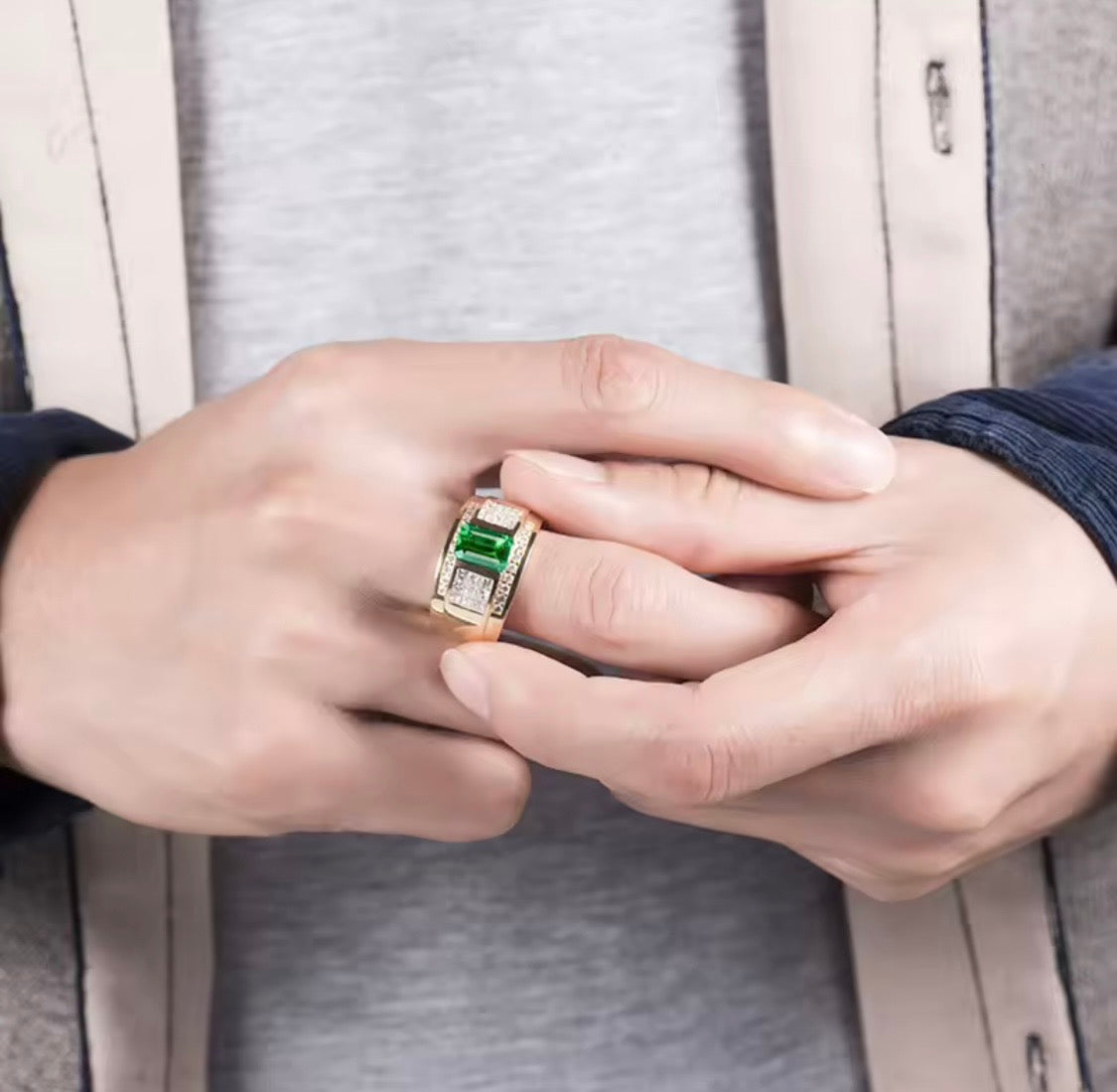 Natural emerald and diamond unisex ring in 14K yellow gold worn on hand