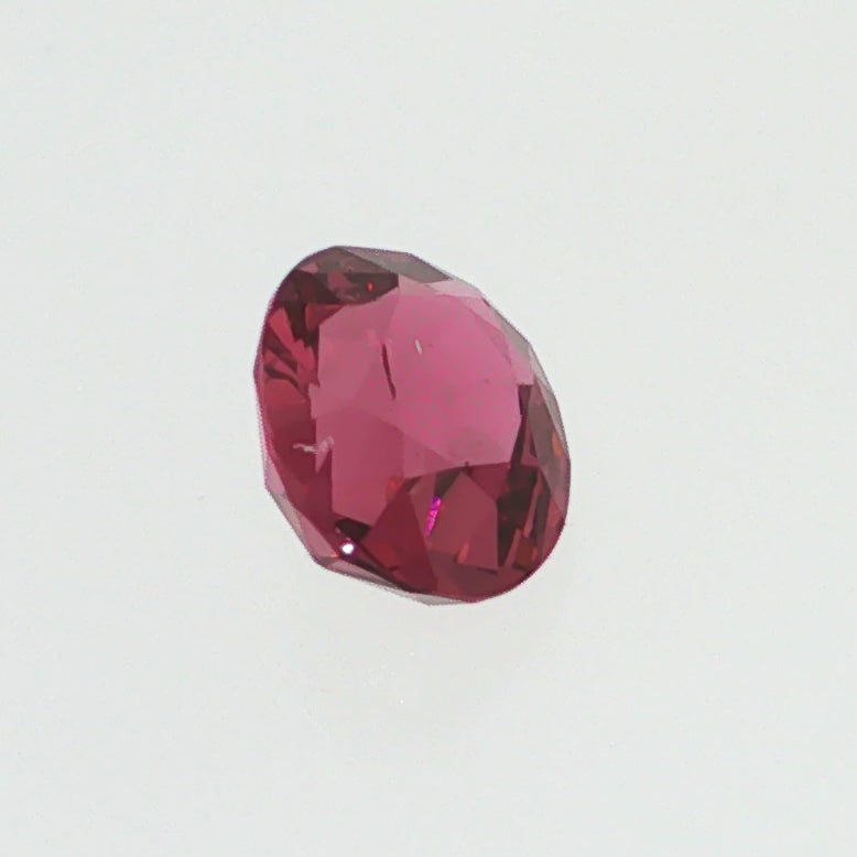 Natural pyrope-almandine garnet, 1.05 carats, oval cut, slightly orangy red color, transparent, ČGL certified gemstone