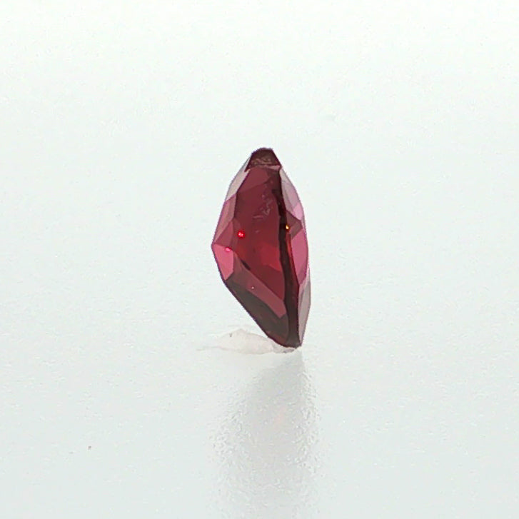 Natural rhodolite garnet, 1.36 carats, heart cut, slightly purplish red color, transparent, ČGL certified gemstone