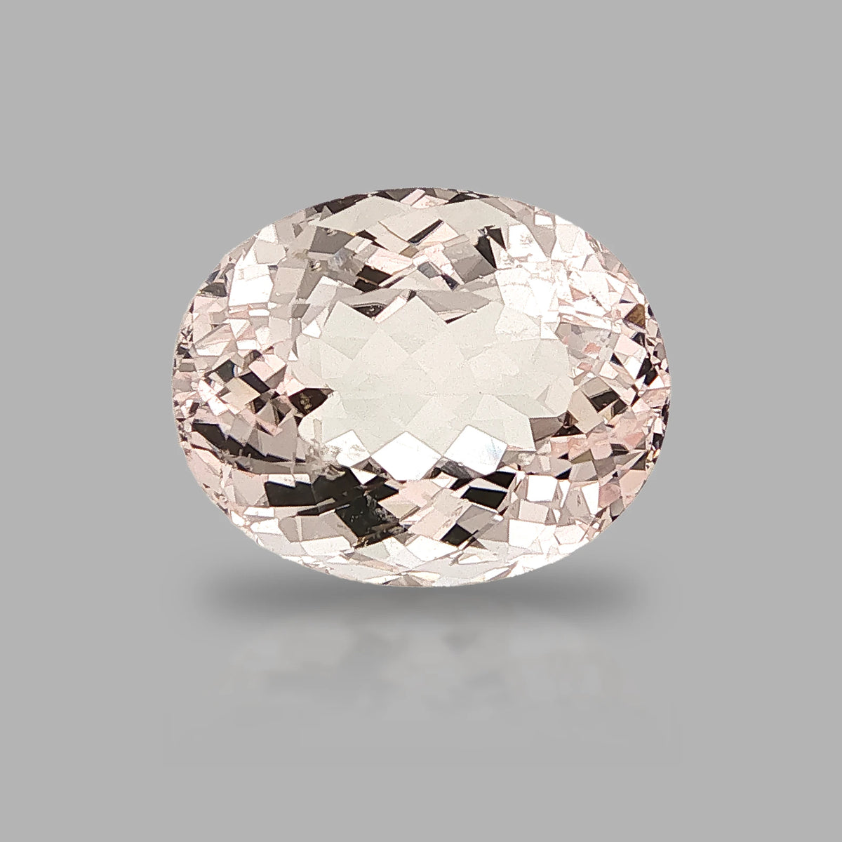 Natural unheated morganite, light orangy pink, oval cut, 12.27 ct, loose gemstone, view 5.