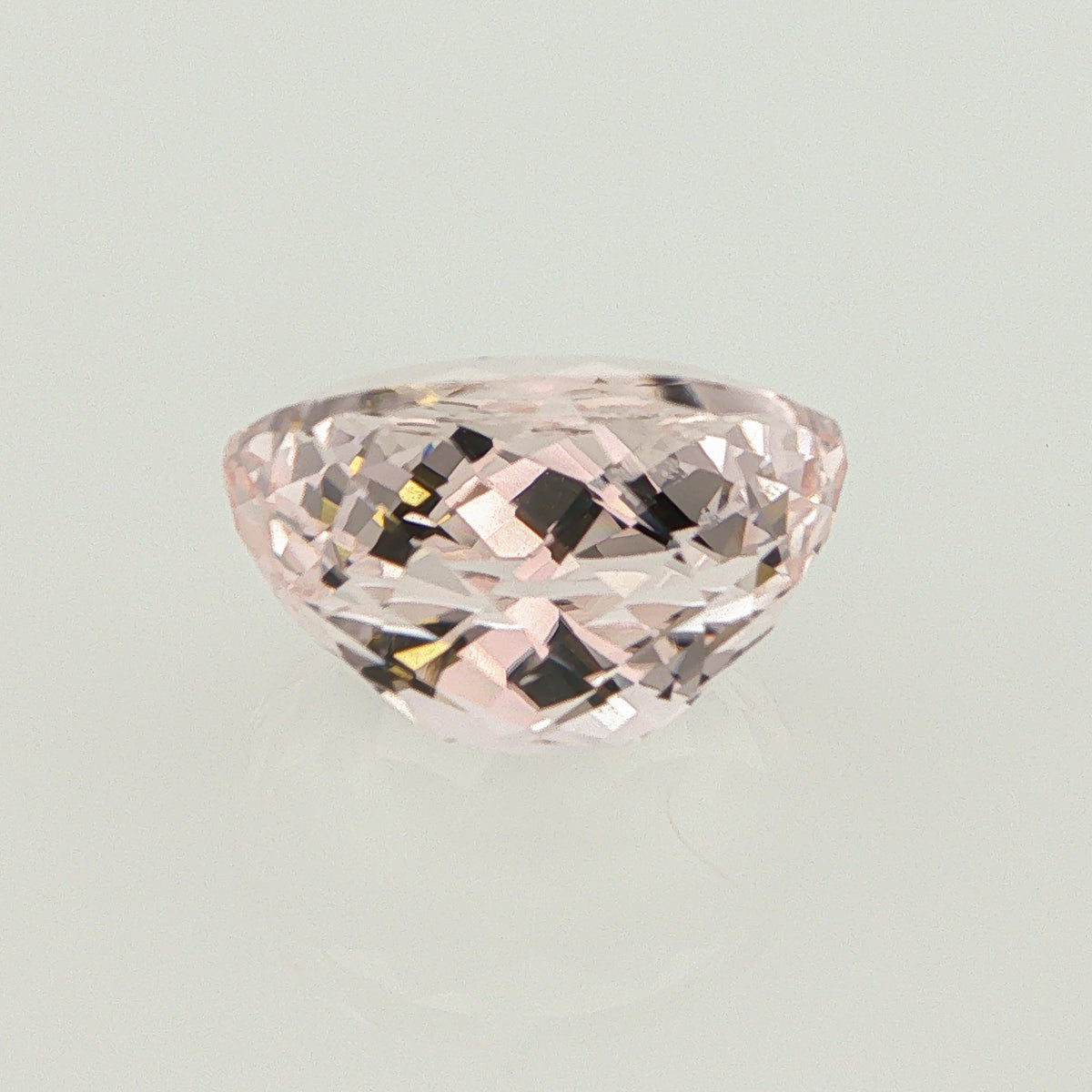 Natural unheated morganite, light orangy pink, oval cut, 12.27 ct, loose gemstone, view 2.