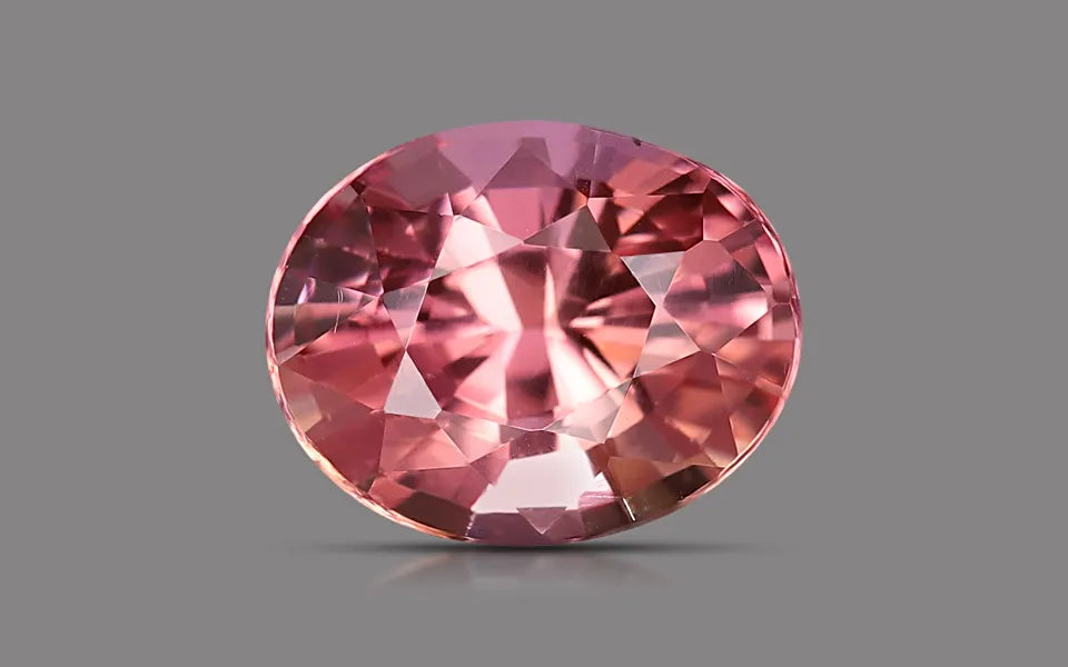Natural sapphire, orangy pink, oval cut, 1.08 ct, loose gemstone, view 2.