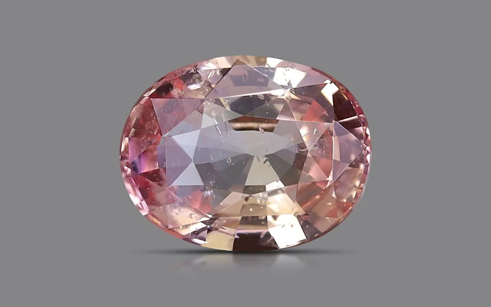 Natural sapphire, padparadscha, oval cut, 1.13 ct, loose gemstone.