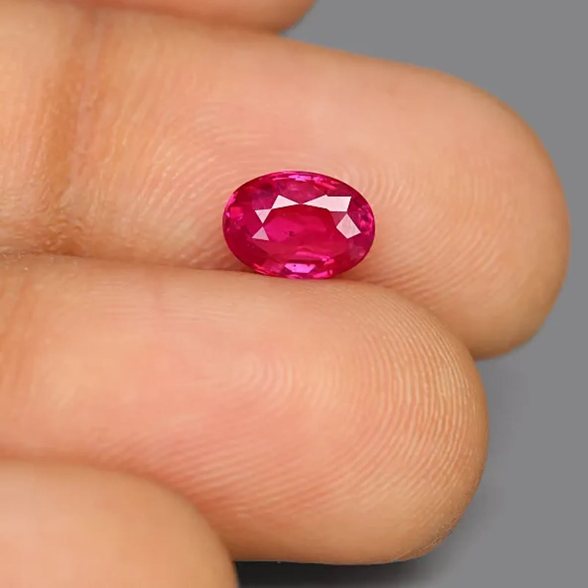 Natural ruby, purplish red, oval cut, 1.54 ct, loose gemstone, view 3.