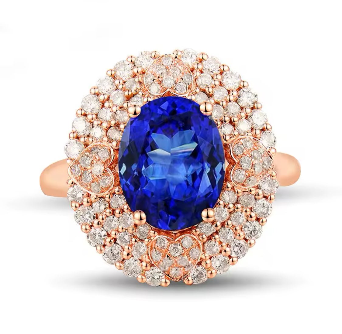 Natural oval tanzanite and diamond halo ring in 18K rose gold front view