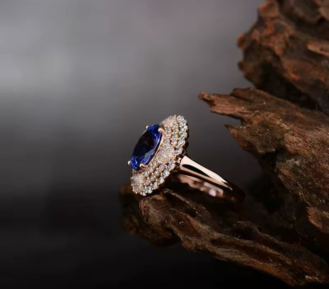 18K rose gold natural tanzanite and diamond halo ring side profile