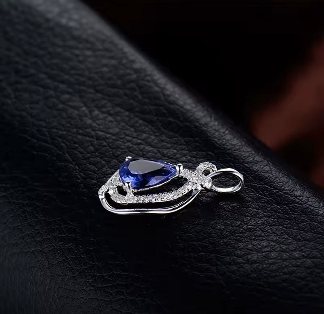 18K white gold natural tanzanite diamond pendant back and setting view