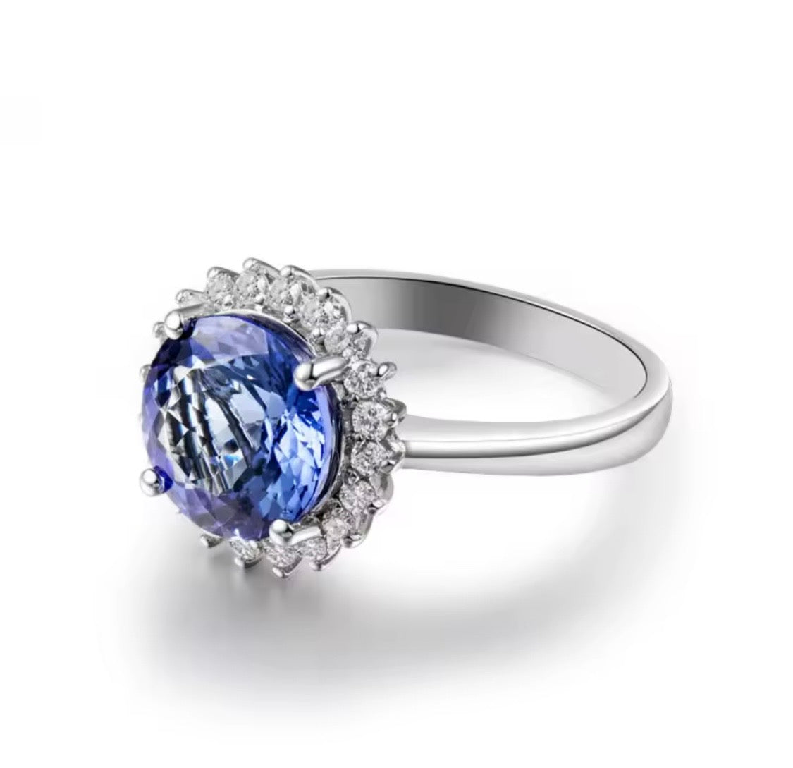 18K white gold natural tanzanite and diamond ring profile view