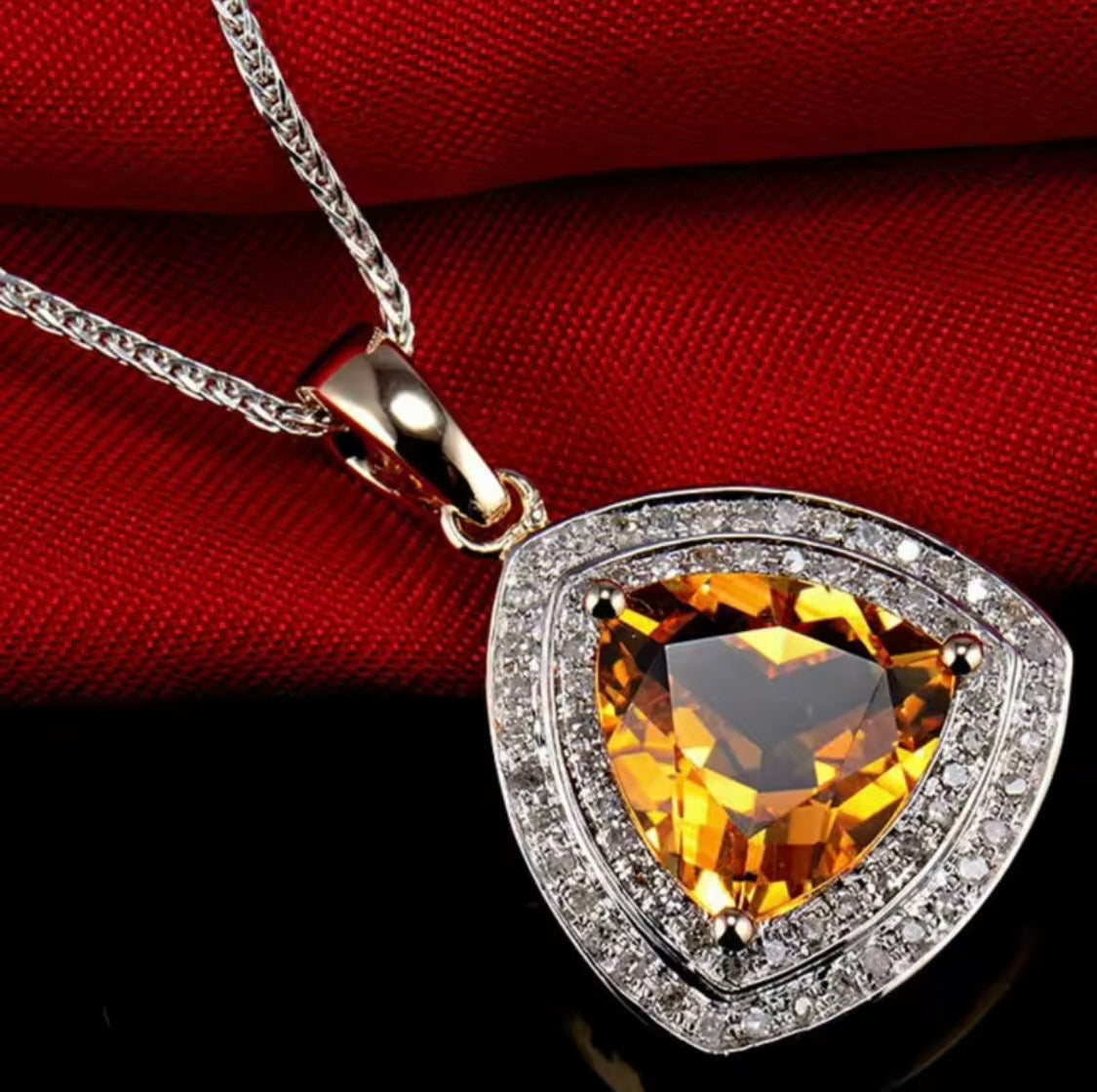Natural trillion citrine and diamond pendant in 14K yellow gold lifestyle view