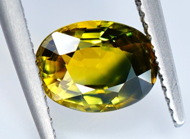 Oval Australian sapphire with green and yellow color 2.06 ct
