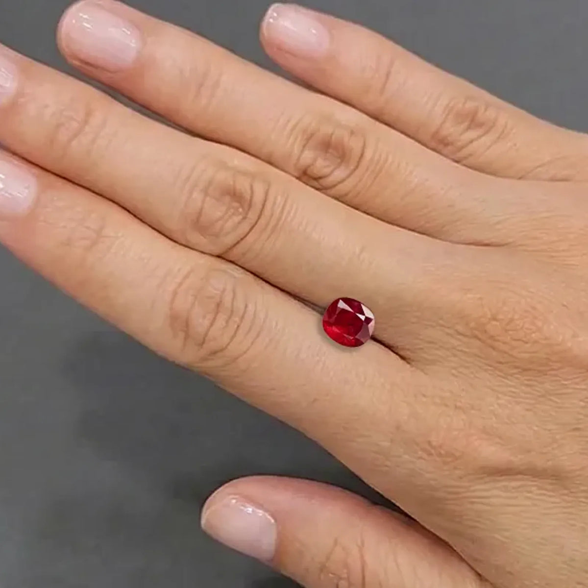 Natural ruby, vivid red, cushion cut, 2.25 ct, loose gemstone, view 3.
