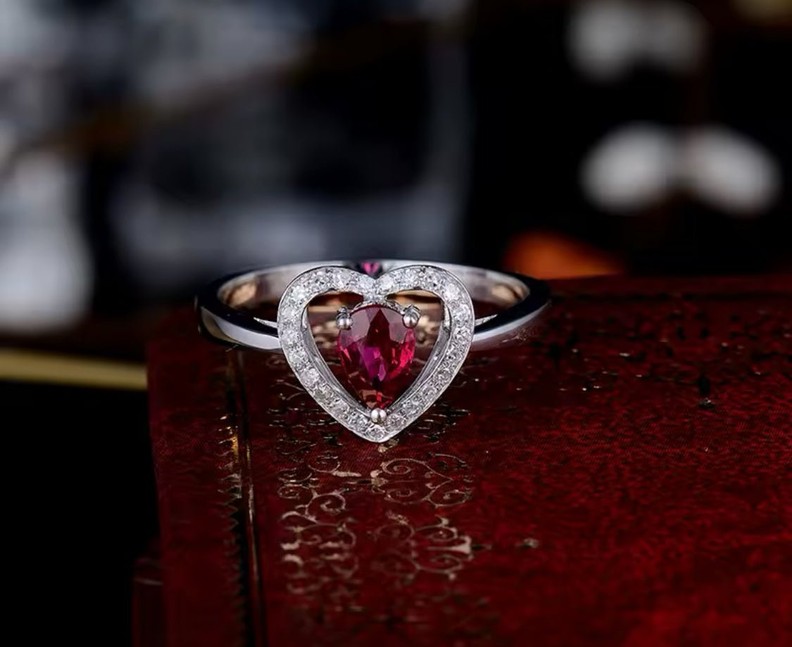 18K white gold ruby diamond ring with 0.55 carat natural pear cut ruby and diamond halo heart design