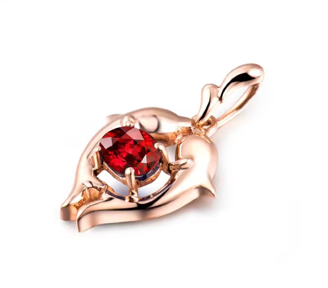 18K rose gold ruby pendant with Pisces zodiac dolphin design and 0.33 carat gemstone