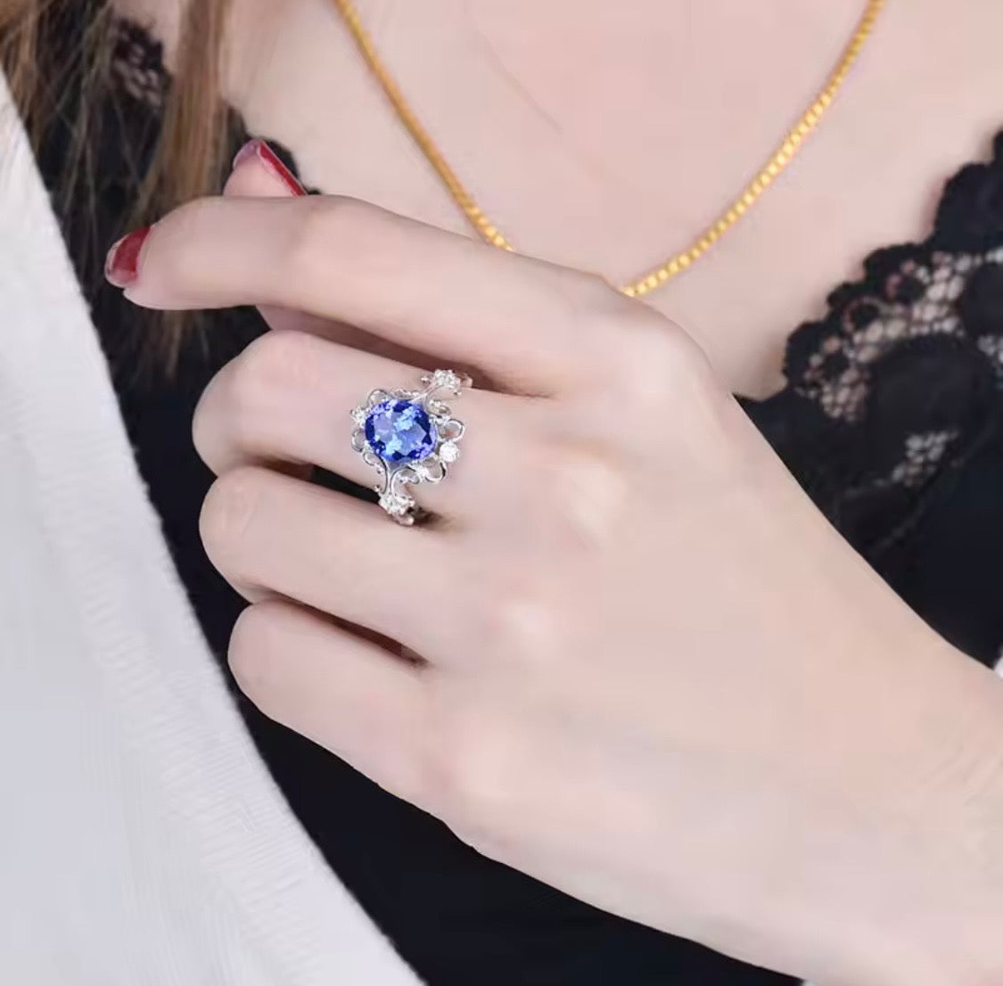 14K white gold tanzanite diamond ring with 1.70 carat oval natural tanzanite princess style design