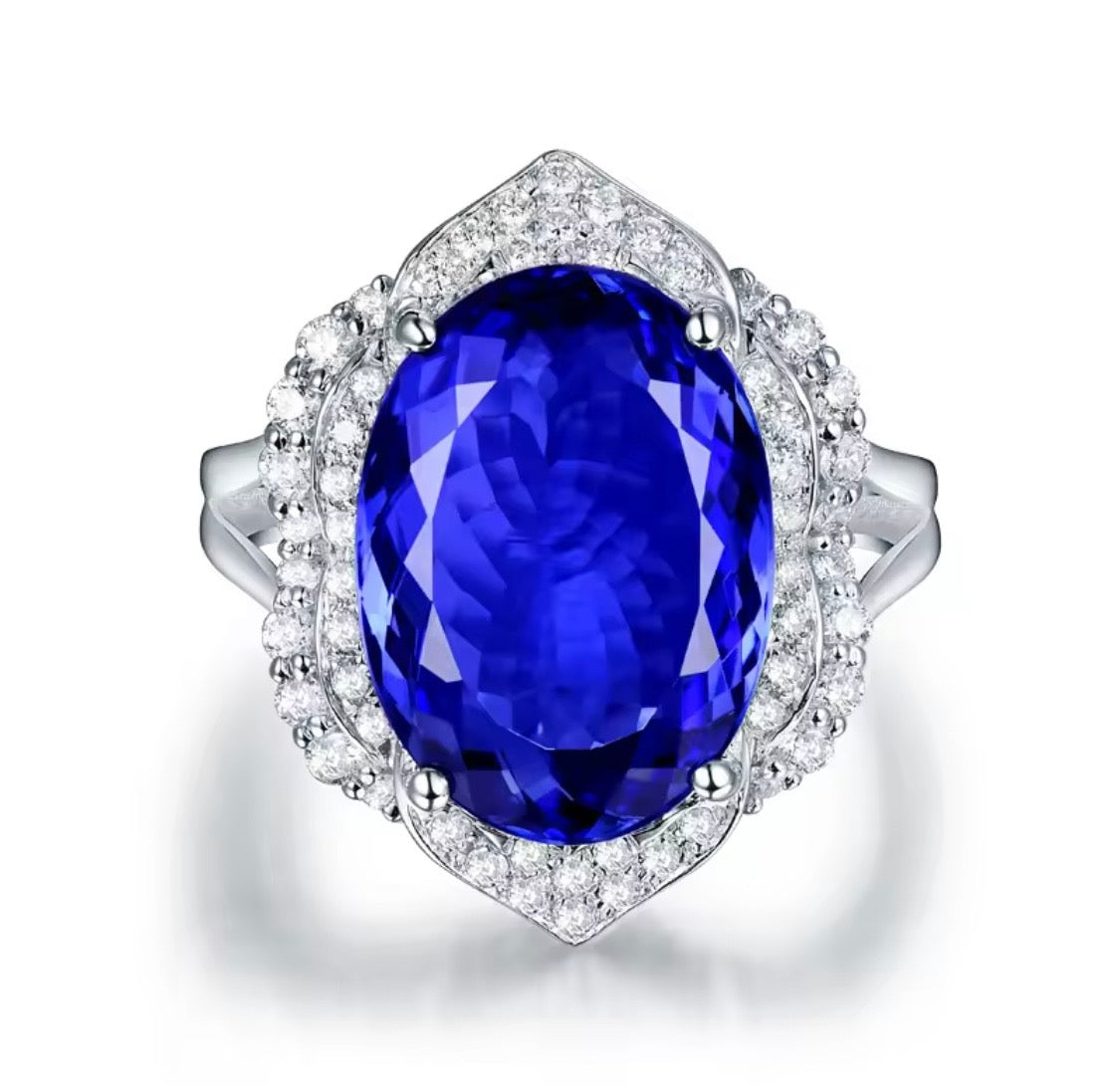 18K white gold tanzanite diamond ring with 8.45 carat oval natural tanzanite and diamond halo unisex