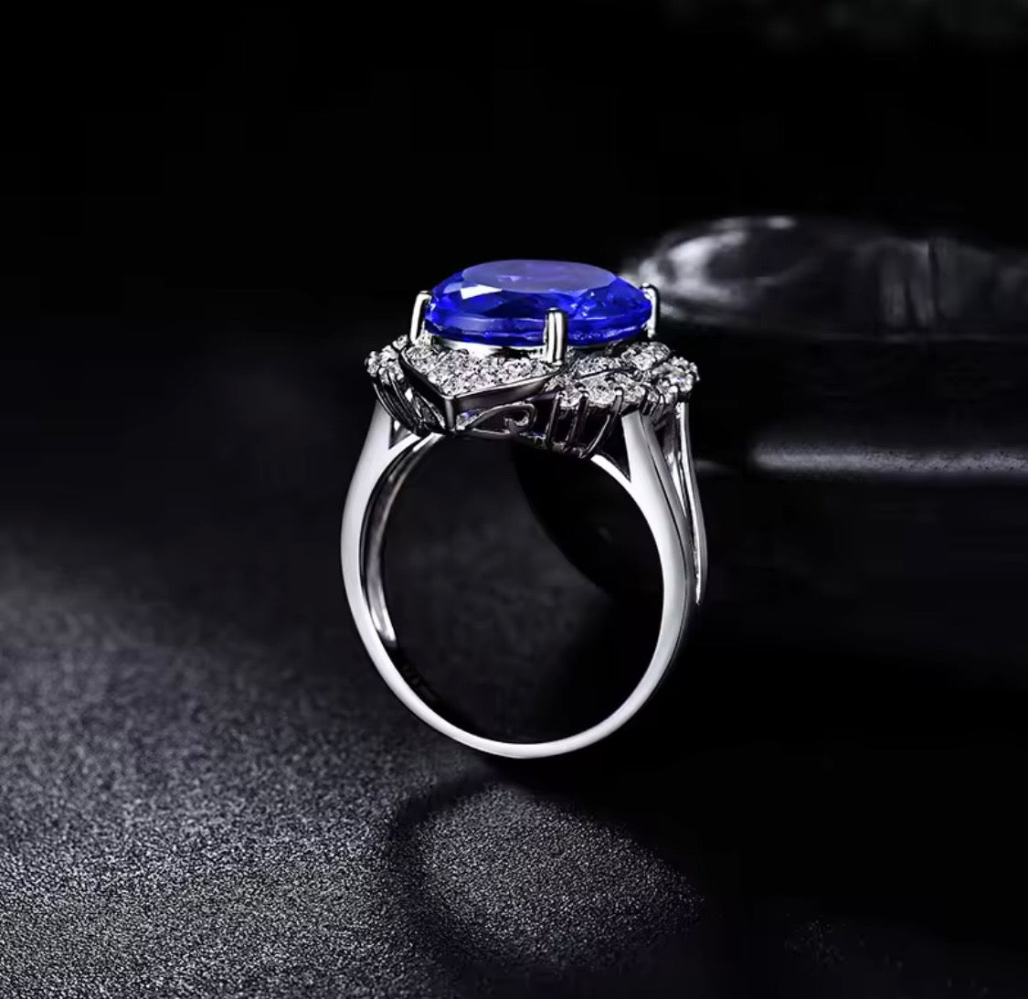 18K white gold tanzanite diamond ring with 8.45 carat oval natural tanzanite and diamond halo unisex