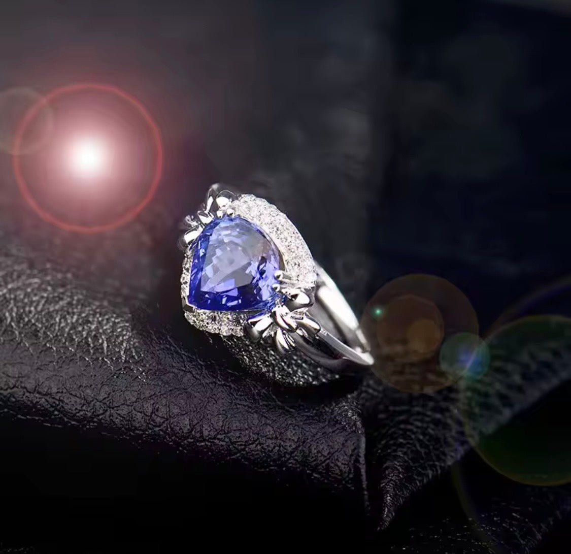 14K white gold tanzanite engagement ring with 2.01 carat pear cut natural tanzanite and diamond halo