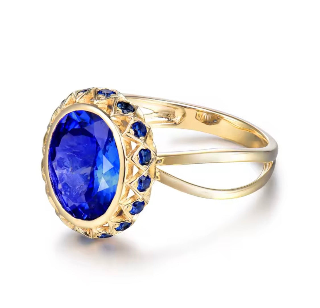 18K yellow gold tanzanite diamond halo ring oval cut royal floral design