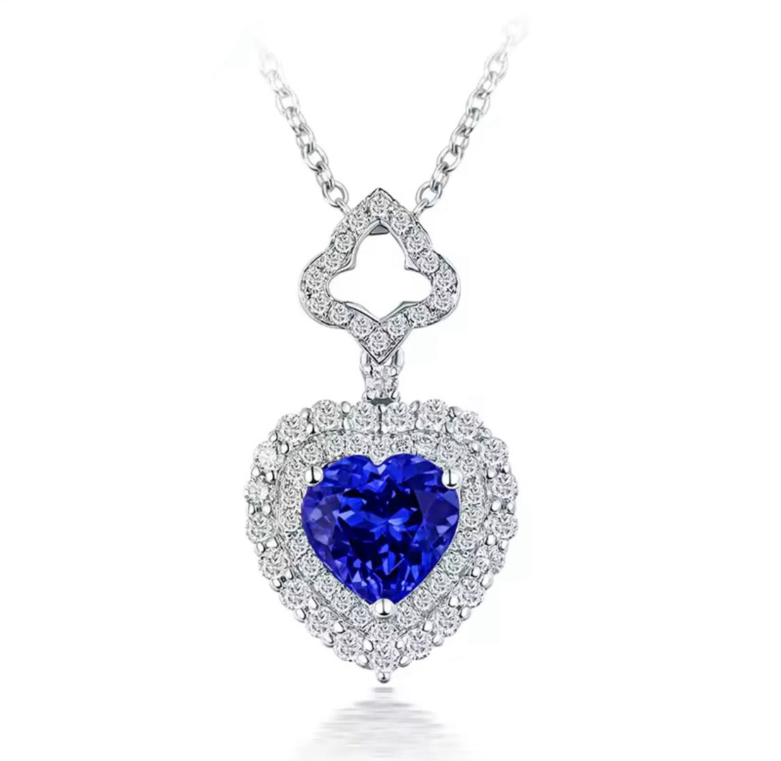 14K gold tanzanite heart pendant with 1.63 carat gemstone and diamond halo