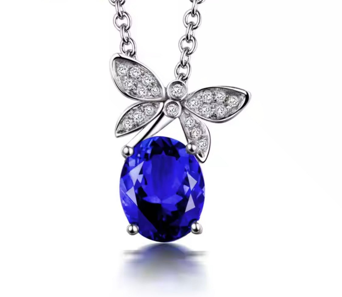 18K gold tanzanite pendant with 2.51 carat oval gemstone and diamond butterfly design