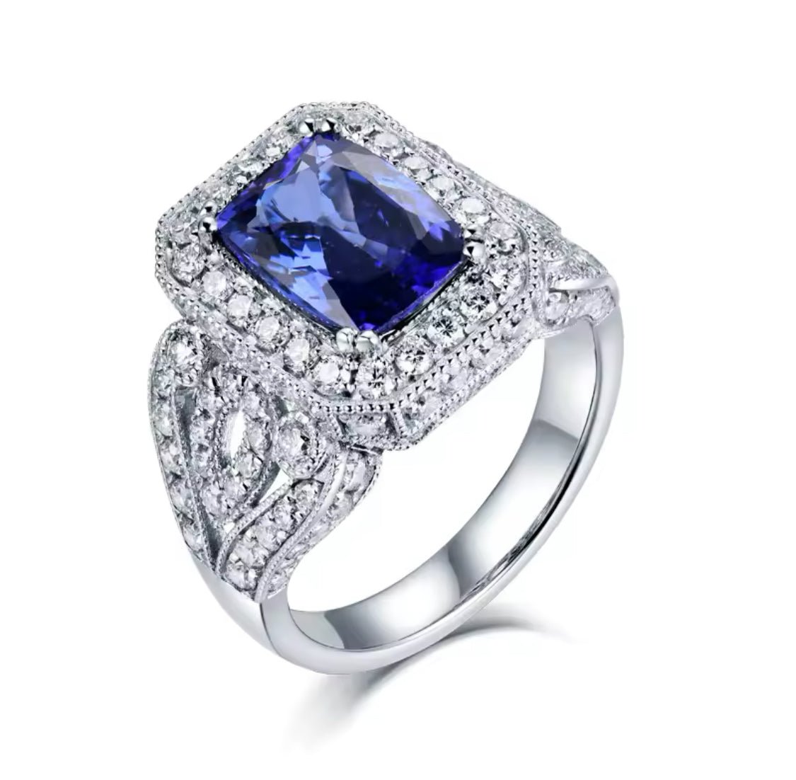 14K white gold tanzanite ring, 3.55 carats cushion cut, very good clarity, natural diamonds 1.80 ct, violet blue gemstone