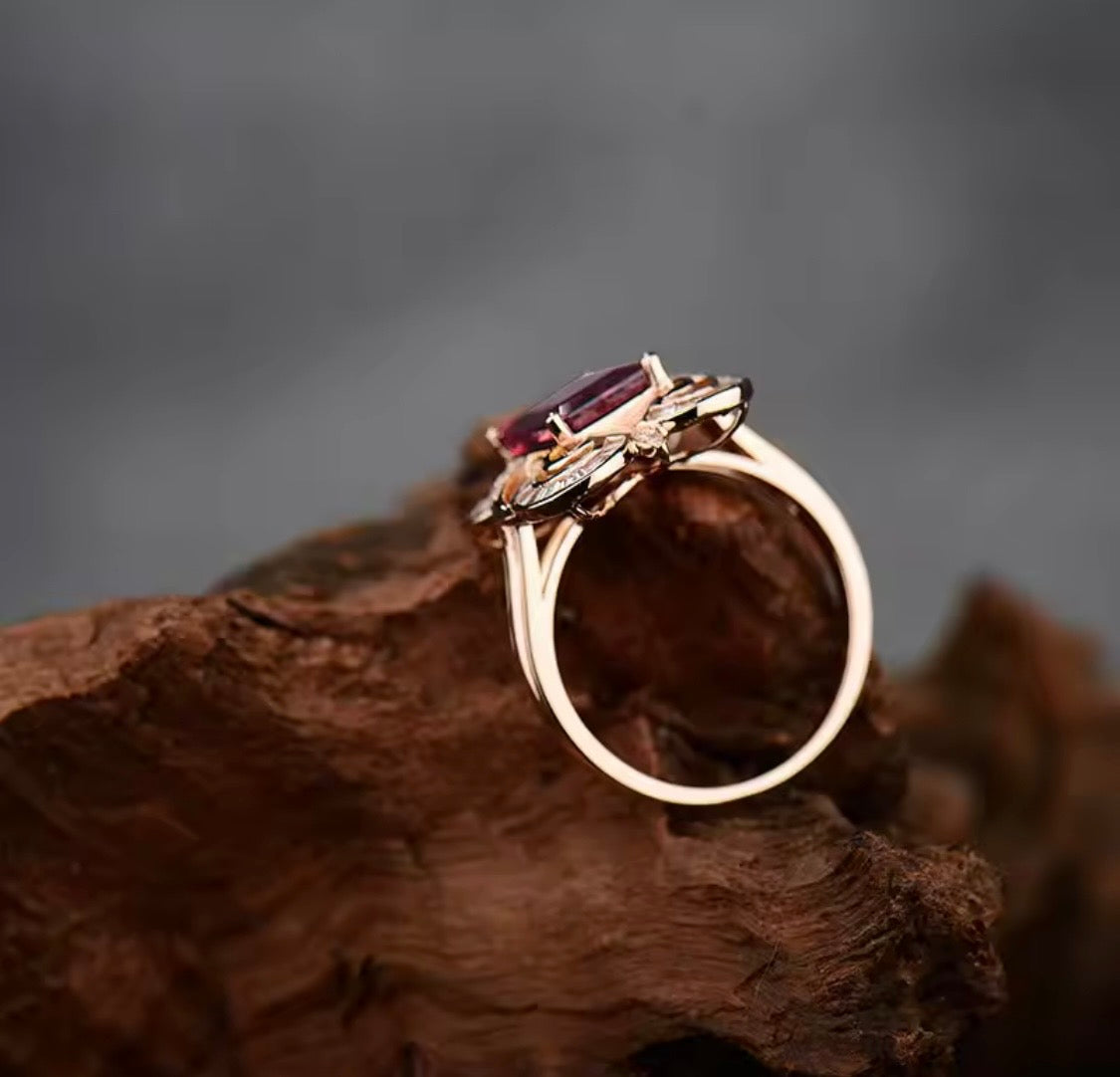 18K rose gold tourmaline diamond ring with 6 carat emerald cut tourmaline and baguette diamond accents