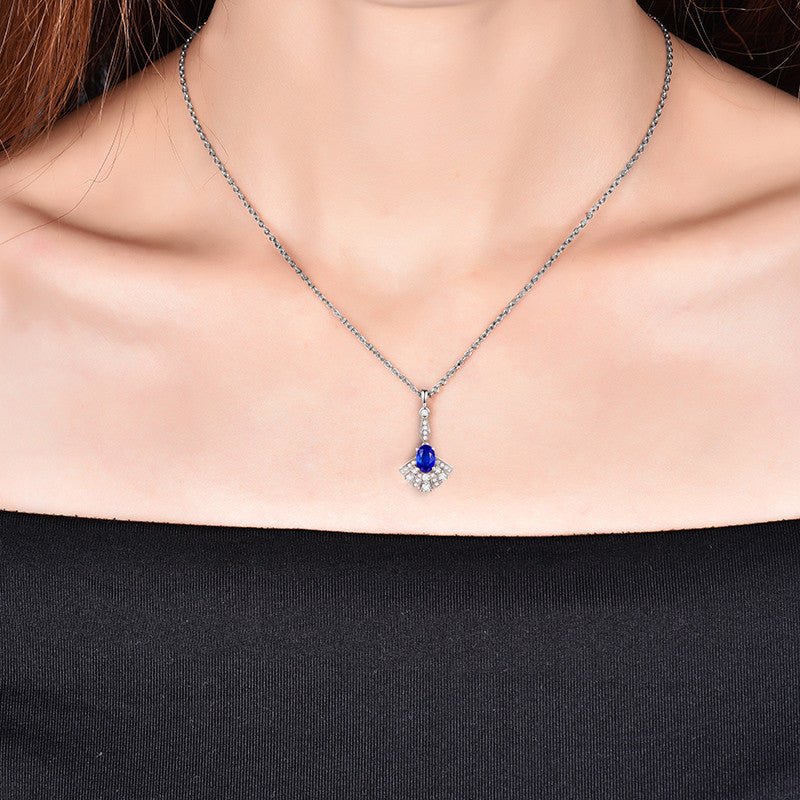 14kt White Gold Diamond 0.17 ct Blue Sapphire Pendant