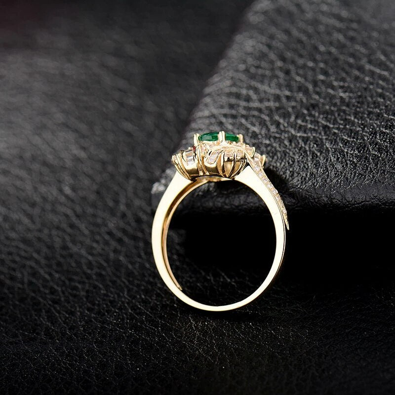 18Kt Gold Natural Diamond & 0.59ct Emerald Ring