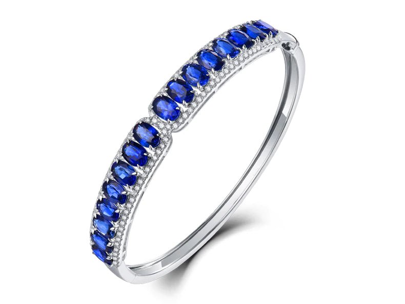 18kt White Gold Bracelet with 8.00 ct Blue Sapphires & 0.86 ct Diamonds – Oval Cut