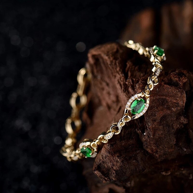 Náramek z 18kt žlutého zlata s 1,150 ct smaragdem a přírodními diamanty 0,34 ct