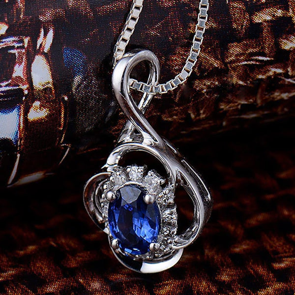 18K White Gold 0.72ct Blue Sapphire Pendant with Natural Diamond