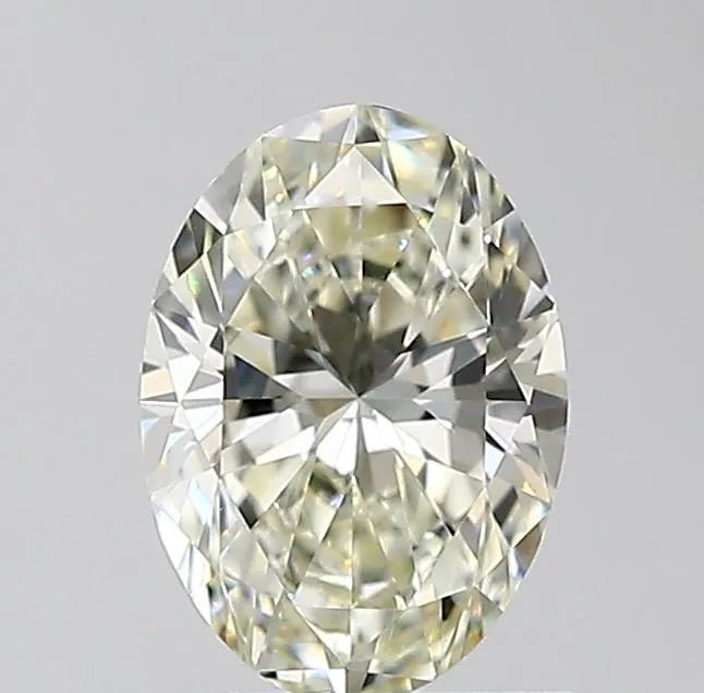 0,59ct oválný přírodní diamant (Barva J, Čistota VS1, Brus VG, IGI Certifikováno)