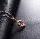 14Kt Rose Gold 0.52 ct Ruby Pendant with Diamonds