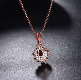 14Kt Rose Gold 0.56 ct Ruby Pendant with Diamonds