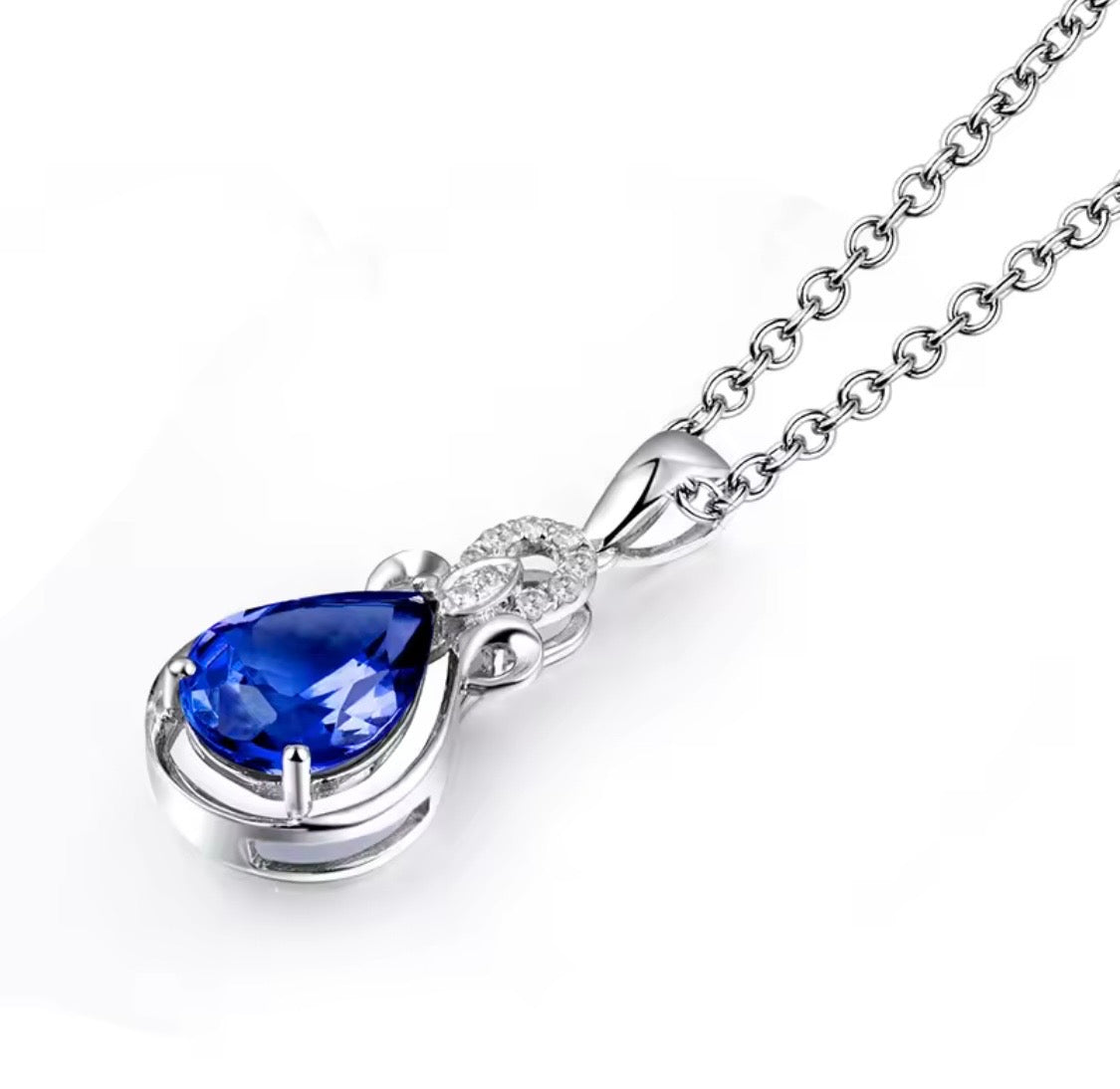 1.85 ct natural pear tanzanite and 0.08 ct diamond pendant in 14K white gold angle view