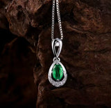 18K White Gold 0.45 ct Emerald Pendant with Natural Diamond