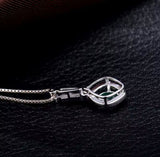 18K White Gold 0.45 ct Emerald Pendant with Natural Diamond