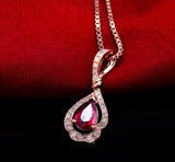 18Kt Rose Gold 0.80 ct Ruby Pendants