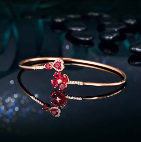 18Kt Rose Gold 1.79 ct Ruby Bracelet with Natural Diamonds