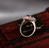 18Kt Rose Gold 2.09 ct Tanzanite Ring with Diamonds