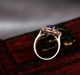 18Kt Rose Gold 2.28 ct Tanzanite Ring with Diamonds
