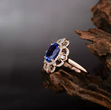 18Kt Rose Gold 2.28 ct Tanzanite Ring with Diamonds