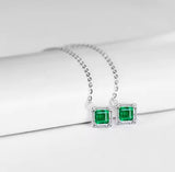 18Kt White Gold 0.60 ct Emerald Earrings