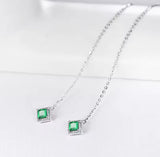18Kt White Gold 0.60 ct Emerald Earrings