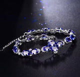 18Kt White Gold 10.72 ct Tanzanite Bracelet with Diamonds