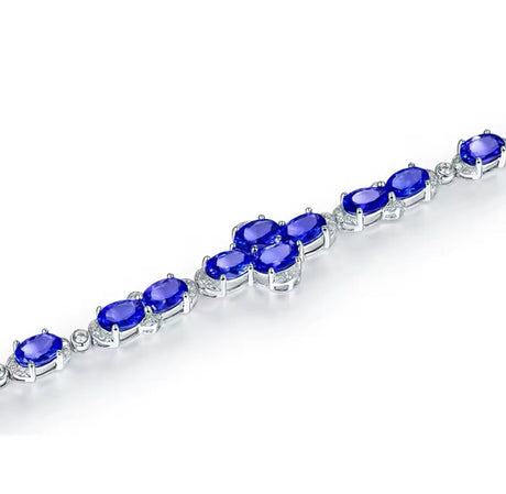 18Kt White Gold 10.72 ct Tanzanite Bracelet with Diamonds