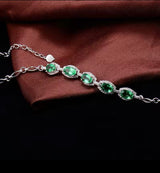 18Kt White Gold 2.18 ct Emerald Bracelet with Diamonds 0.24 ct