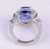 18Kt White Gold 4.87 ct Tanzanite Ring with Diamonds (Unisex)